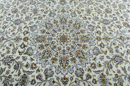 Central medallion detail of 2000s Kashan rug from Iran / Persia
