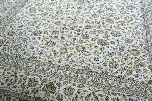 Close-up detail of 2000s Kashan rug from Iran / Persia showing Wool weave