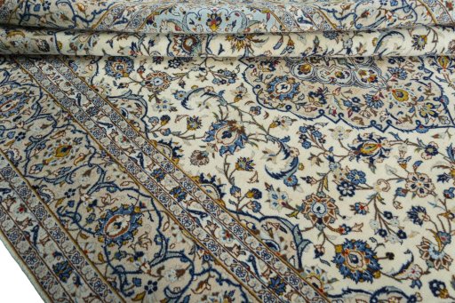 Close-up detail of 2000s Kashan rug from Iran / Persia showing Wool weave