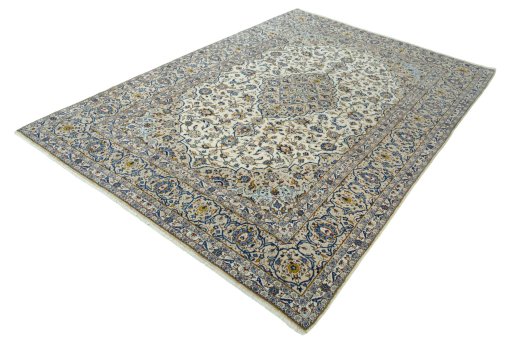 Corner detail of 2000s Kashan rug showing border pattern and Wool pile