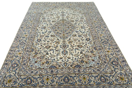 Surface texture of 2000s Kashan rug with natural Wool and intricate pattern