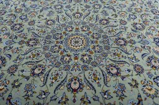 Central medallion detail of 2000s Kashan rug from Iran / Persia