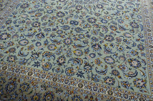 Close-up detail of 2000s Kashan rug from Iran / Persia showing Wool weave