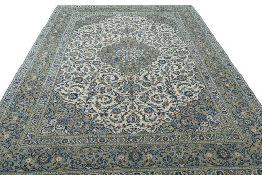 Surface texture of 2000s Kashan rug with natural Wool and intricate pattern