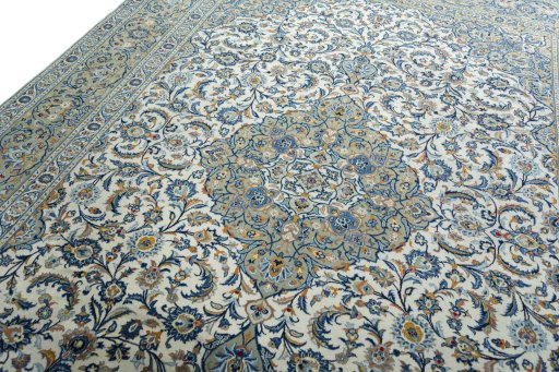 Backside of handmade 2000s Kashan rug showing knot structure and weave density