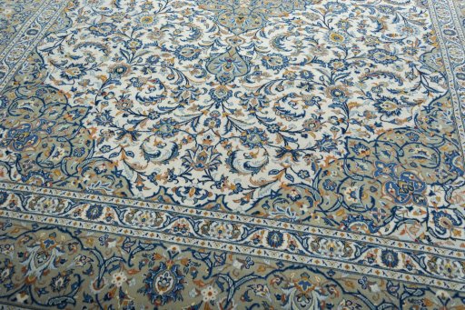 Close-up detail of 2000s Kashan rug from Iran / Persia showing Wool weave