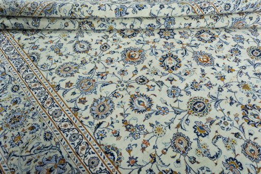 Close-up detail of 2000s Kashan rug from Iran / Persia showing Wool weave