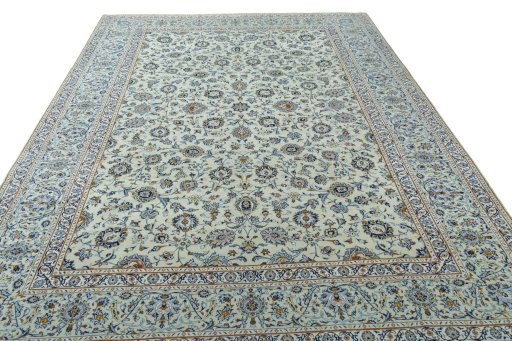 Surface texture of 2000s Kashan rug with natural Wool and intricate pattern