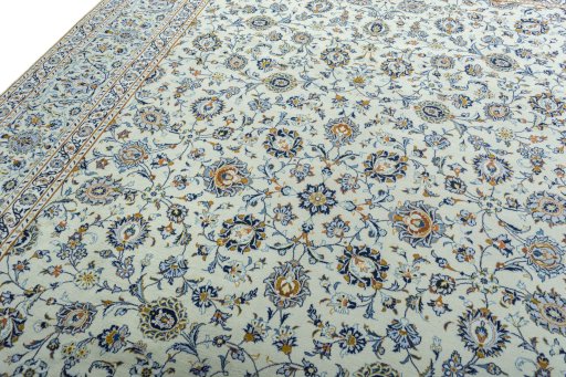 Backside of handmade 2000s Kashan rug showing knot structure and weave density