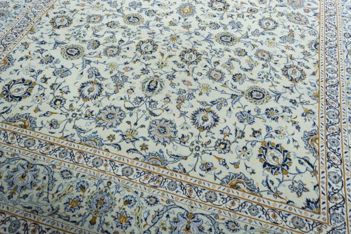 Close-up detail of 2000s Kashan rug from Iran / Persia showing Wool weave