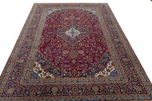 Surface texture of 2000s Kashan rug with natural Wool and intricate pattern
