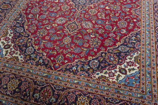 Close-up detail of 2000s Kashan rug from Iran / Persia showing Wool weave