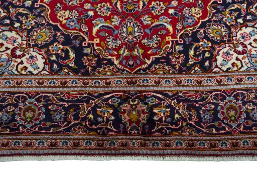 Full view of 2000s Kashan rug from Iran / Persia, 317 × 201 cm in Red tones