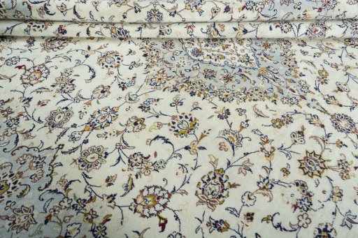Close-up detail of 2000s Kashan rug from Iran / Persia showing Wool weave