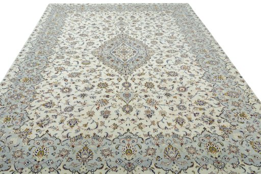 Surface texture of 2000s Kashan rug with natural Wool and intricate pattern