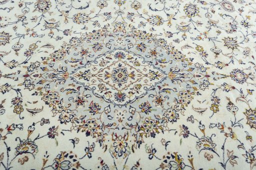 Central medallion detail of 2000s Kashan rug from Iran / Persia