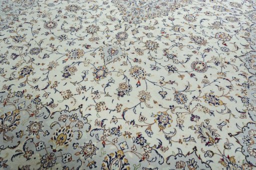 Close-up detail of 2000s Kashan rug from Iran / Persia showing Wool weave