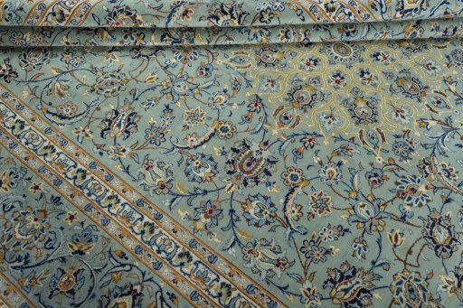 Close-up detail of 2000s Kashan rug from Iran / Persia showing Wool weave