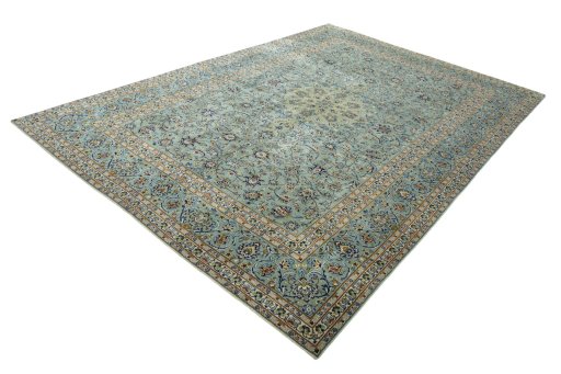 Corner detail of 2000s Kashan rug showing border pattern and Wool pile