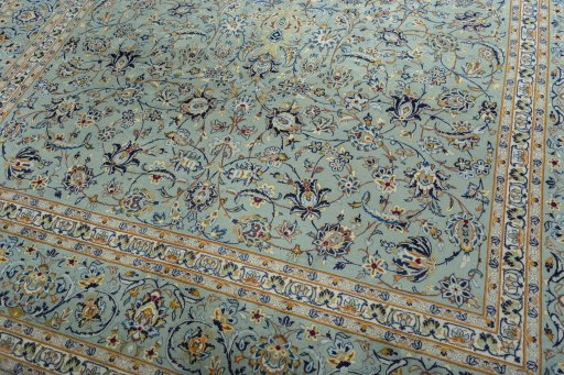 Close-up detail of 2000s Kashan rug from Iran / Persia showing Wool weave