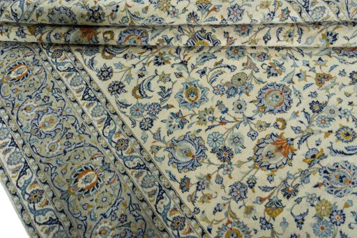 Close-up detail of 2000s Kashan rug from Iran / Persia showing Wool weave