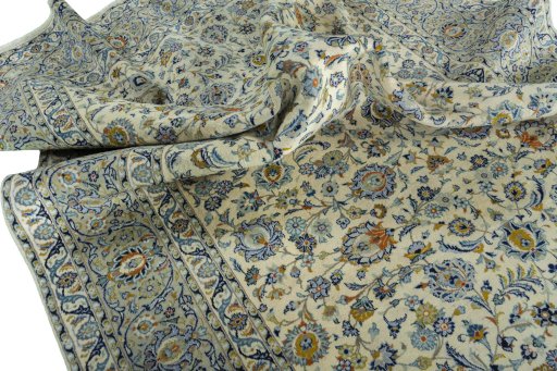 Surface texture of 2000s Kashan rug with natural Wool and intricate pattern