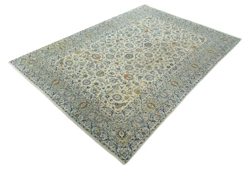 Corner detail of 2000s Kashan rug showing border pattern and Wool pile