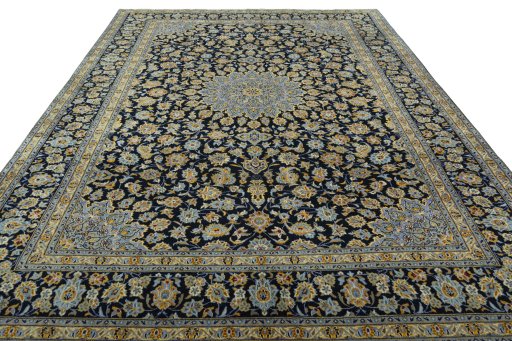 Surface texture of 2000s Kashan rug with natural Wool and intricate pattern