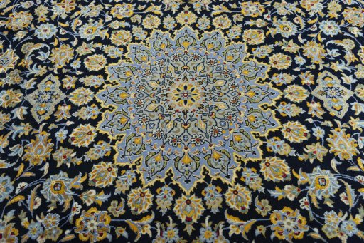 Central medallion detail of 2000s Kashan rug from Iran / Persia
