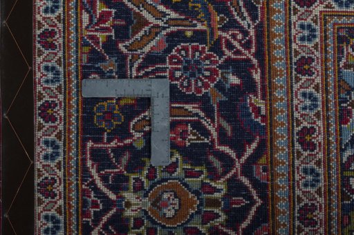 Central medallion detail of 2000s Kashan rug from Iran / Persia