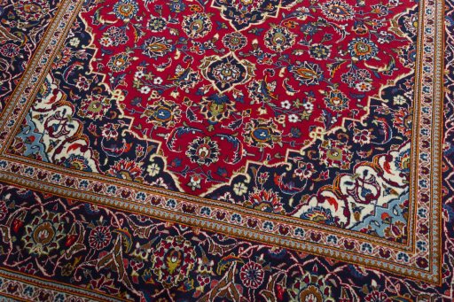 Close-up detail of 2000s Kashan rug from Iran / Persia showing Wool weave