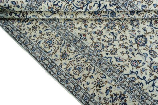 Close-up detail of 2000s Kashan rug from Iran / Persia showing Wool weave