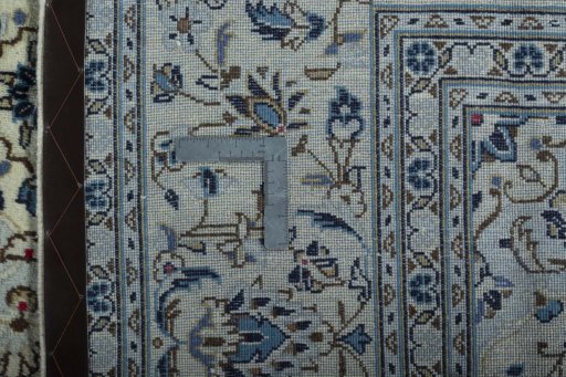 Central medallion detail of 2000s Kashan rug from Iran / Persia