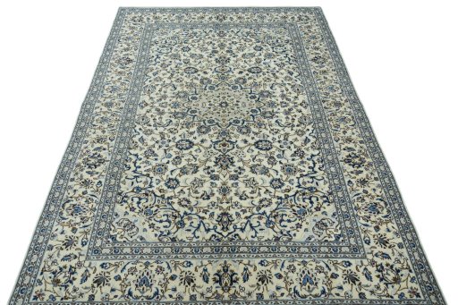Surface texture of 2000s Kashan rug with natural Wool and intricate pattern