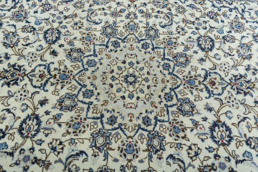 Central medallion detail of 2000s Kashan rug from Iran / Persia