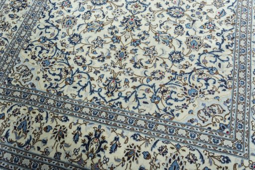 Close-up detail of 2000s Kashan rug from Iran / Persia showing Wool weave
