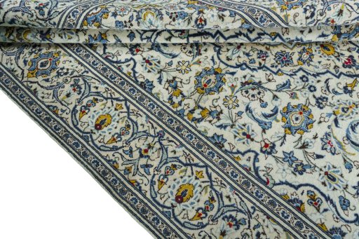 Close-up detail of 2000s Kashan rug from Iran / Persia showing Wool weave