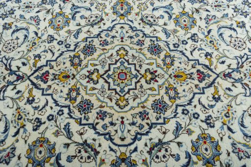 Central medallion detail of 2000s Kashan rug from Iran / Persia