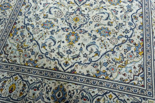 Close-up detail of 2000s Kashan rug from Iran / Persia showing Wool weave