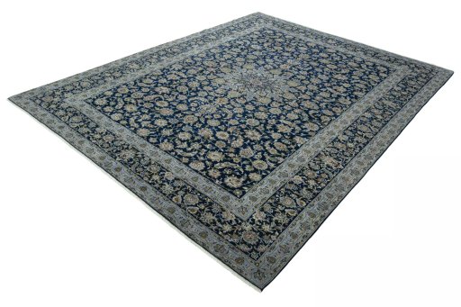 Corner detail of 2000s Kashan rug showing border pattern and Wool pile
