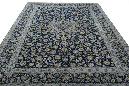 Surface texture of 2000s Kashan rug with natural Wool and intricate pattern