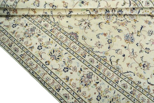 Close-up detail of New Kashan rug from Iran / Persia showing Wool weave