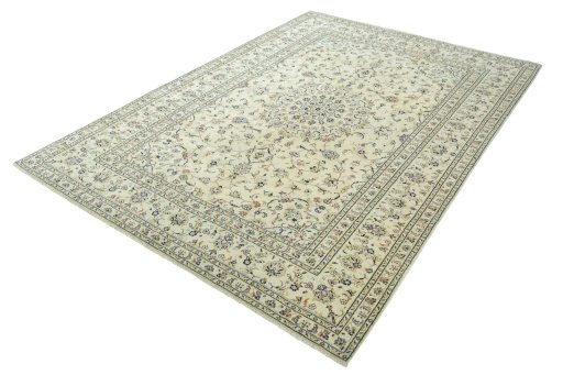 Corner detail of New Kashan rug showing border pattern and Wool pile