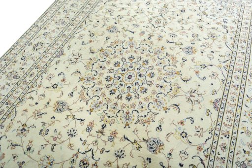 Backside of handmade New Kashan rug showing knot structure and weave density