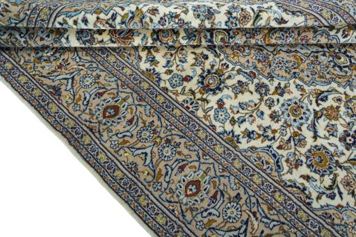 Close-up detail of 2000s Kashan rug from Iran / Persia showing Wool weave