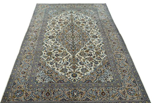 Surface texture of 2000s Kashan rug with natural Wool and intricate pattern