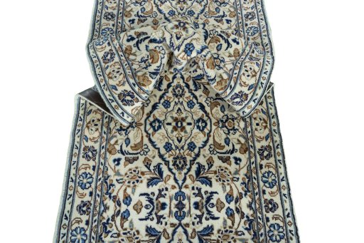 Close-up detail of 2000s Kashan rug from Iran / Persia showing Wool weave