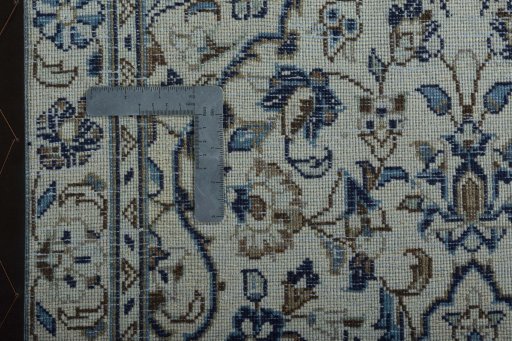 Surface texture of 2000s Kashan rug with natural Wool and intricate pattern