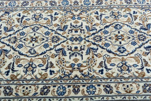 Central medallion detail of 2000s Kashan rug from Iran / Persia