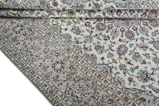 Close-up detail of 2000s Kashan rug from Iran / Persia showing Wool weave